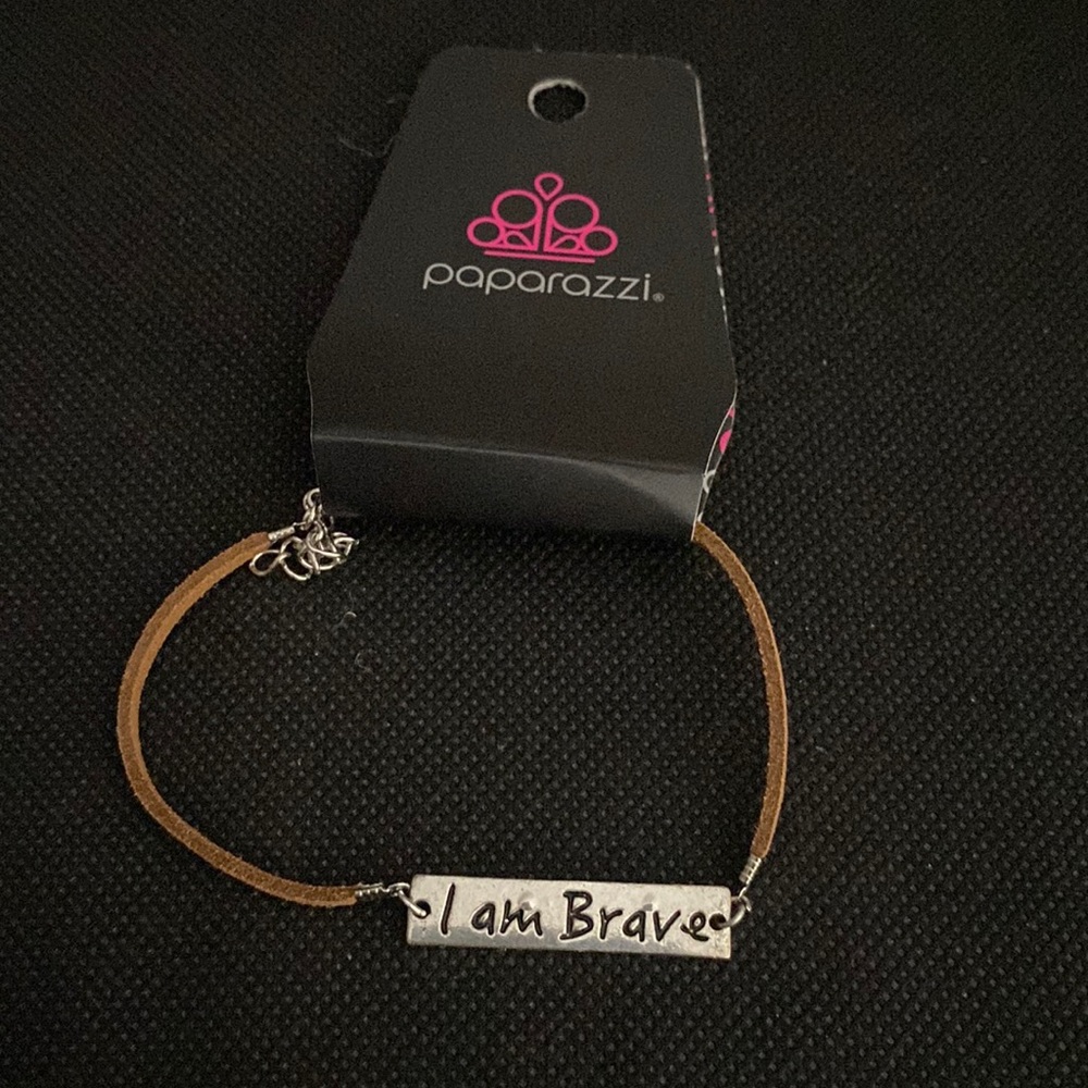 Dainty brown leather cord “I am brave” bracelet.